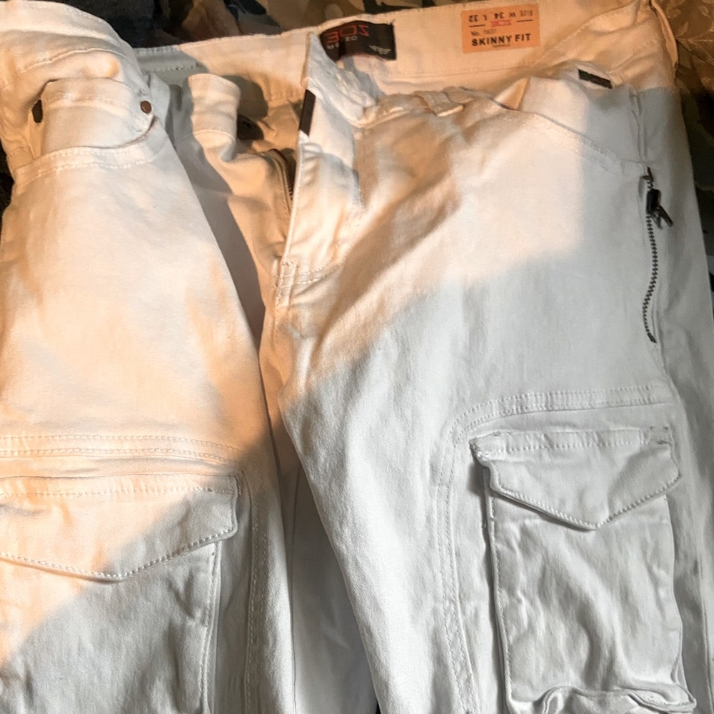 Distressed white jeans